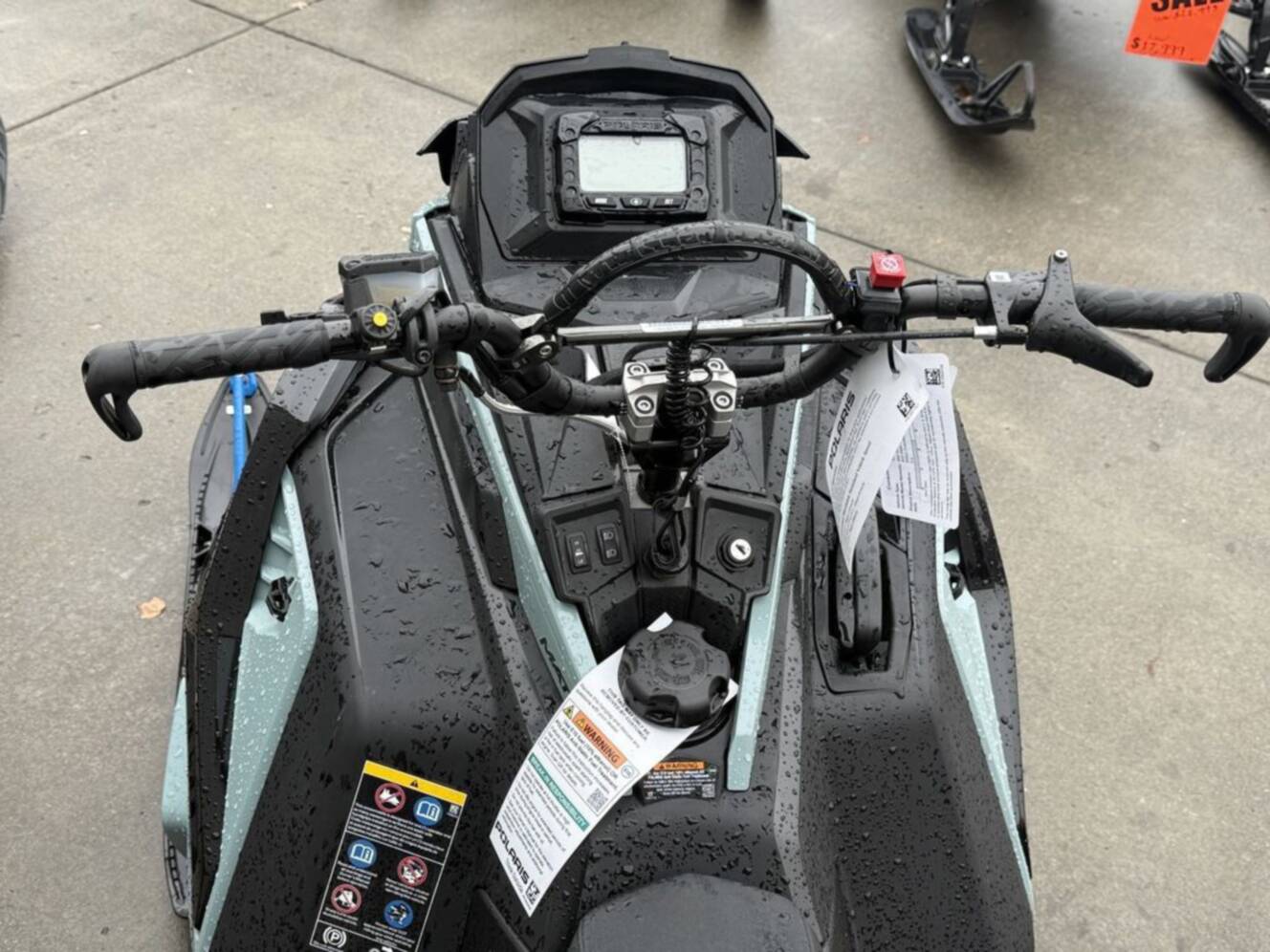 A photo of this 2026 Polaris 850 RMK Khaos 155 Gloss Black / Blue Dusk 850