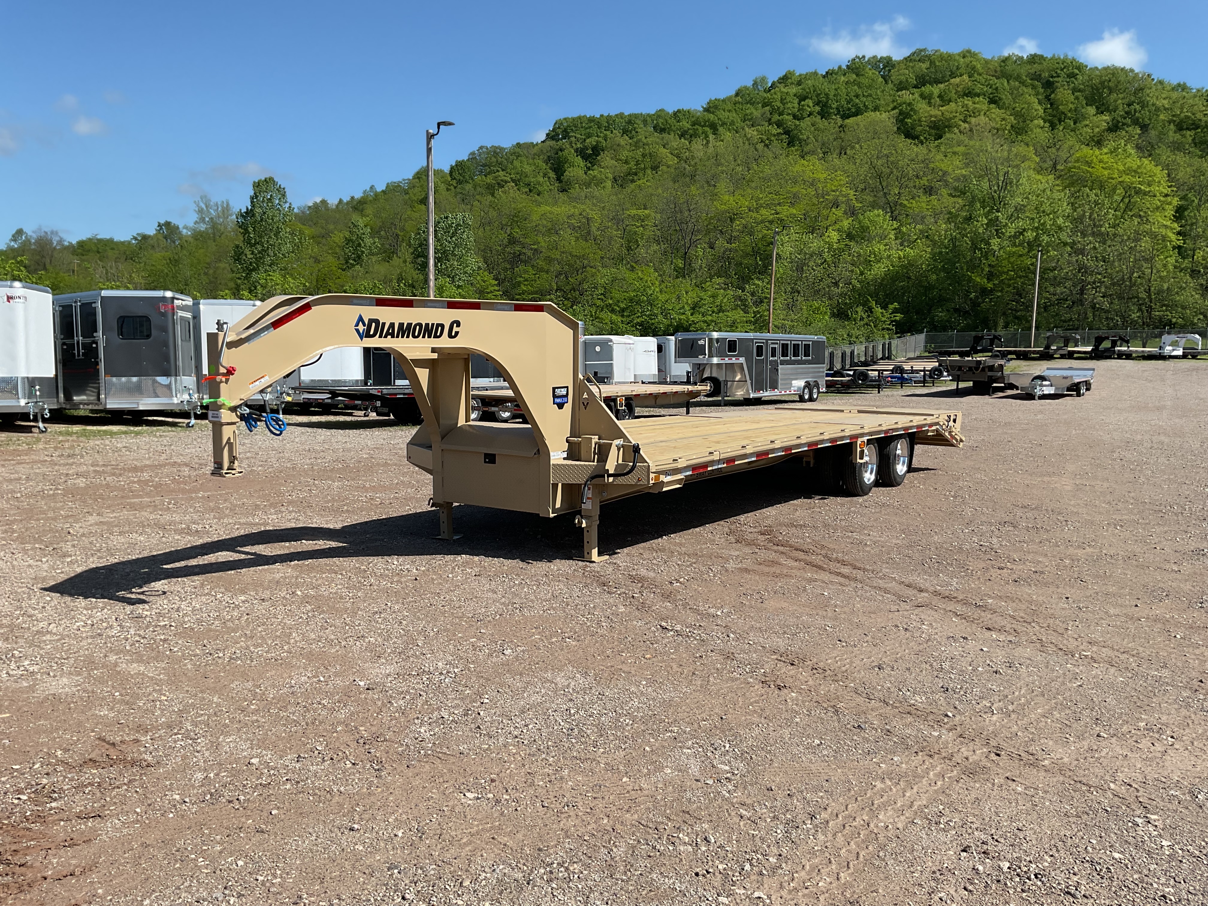 2025 Diamond C 30' Dual Axle w/Max-Ramps Flatbed Equipment Trailer in Athens, OH