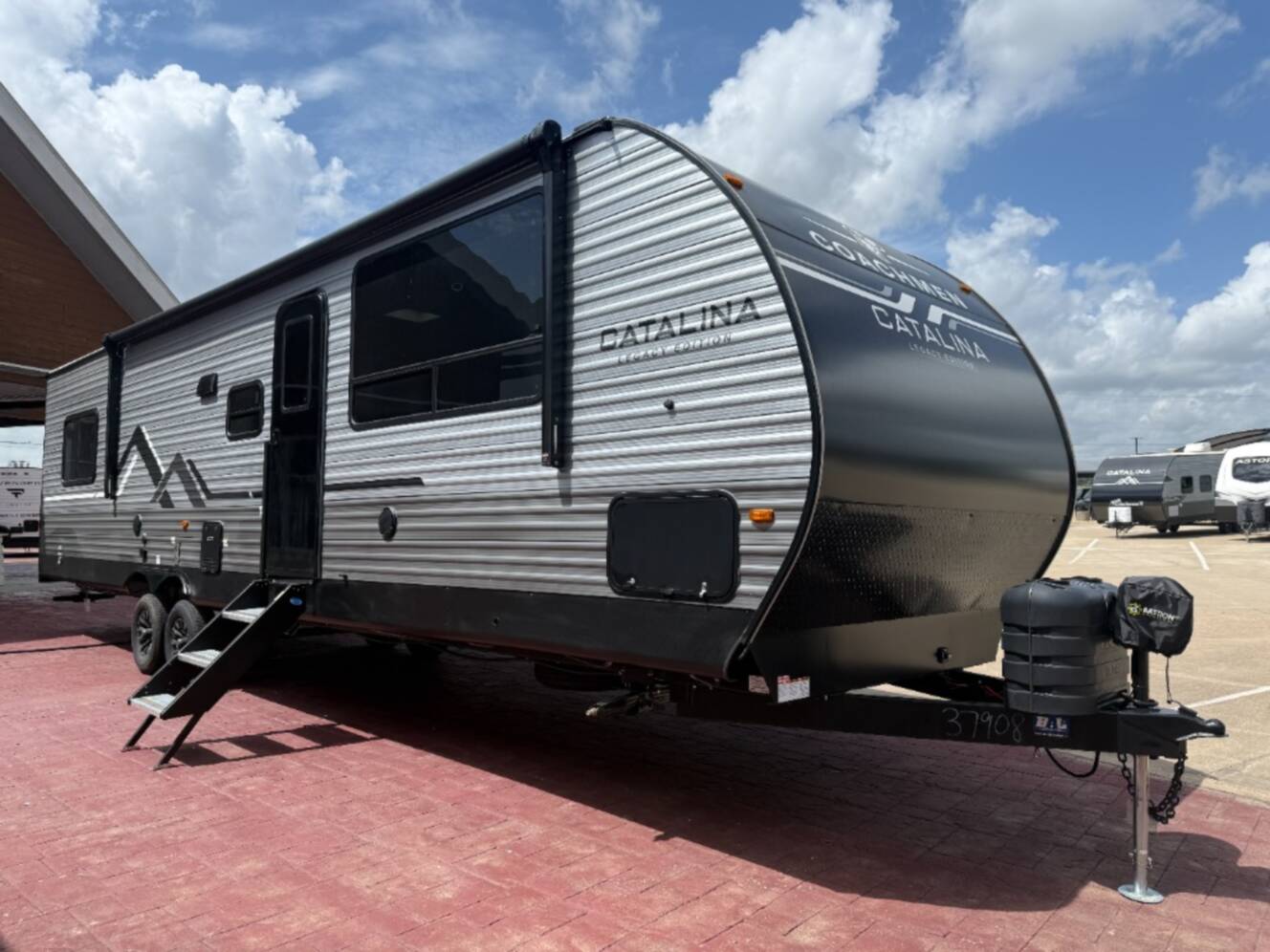 A photo of this 2027 Coachmen Rv Catalina Legacy Edition 343BHTS 2 Queen Beds