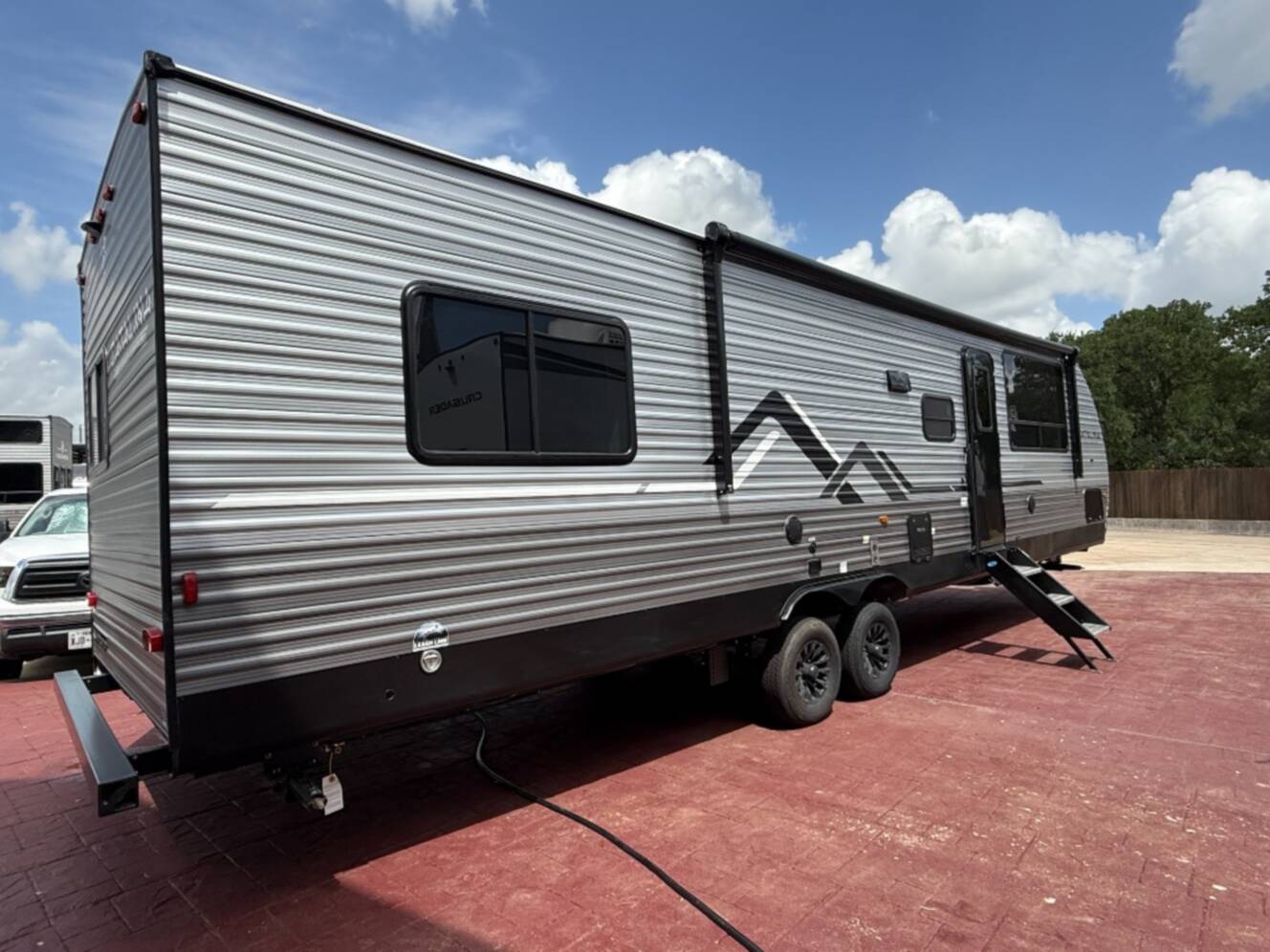 A photo of this 2027 Coachmen Rv Catalina Legacy Edition 343BHTS 2 Queen Beds