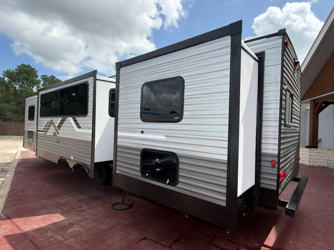 A photo of this 2027 Coachmen Rv Catalina Legacy Edition 343BHTS 2 Queen Beds