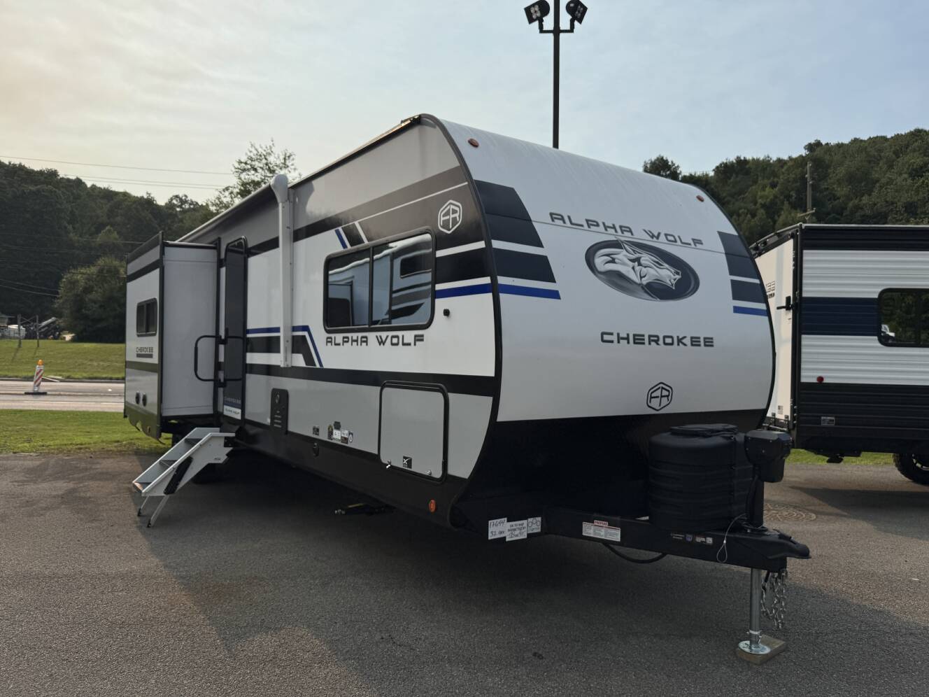 A photo of this 2027 Forest River Cherokee Alpha Wolf 32BHX-L