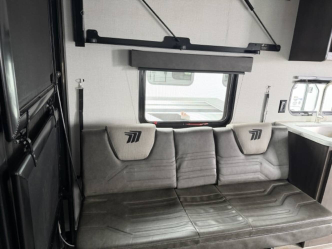 A photo of this 2024 Grand Design Momentum MAV 22MAV