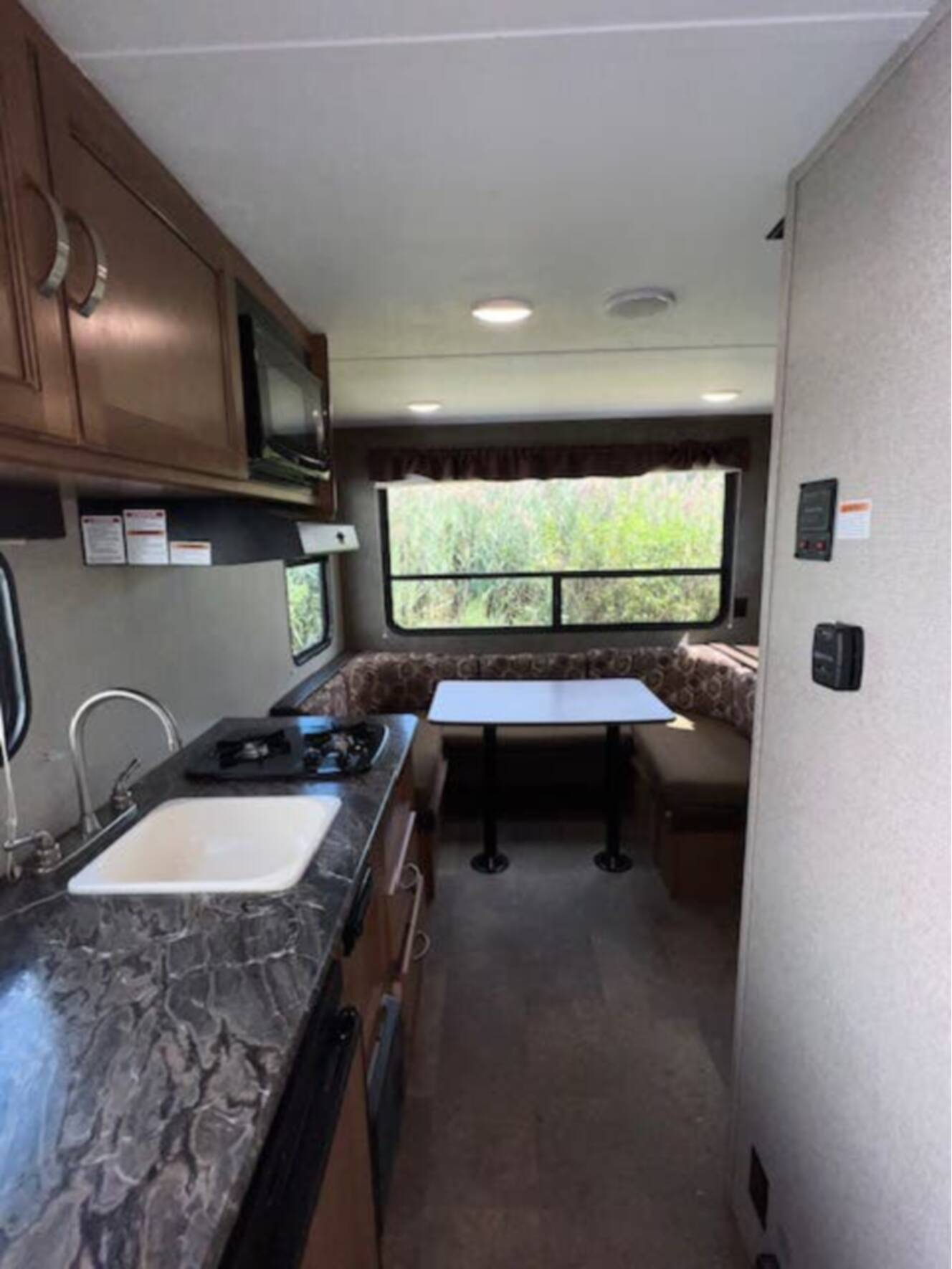 A photo of this 2018 Keystone Springdale Summerland Mini 1750RD Front East-West Queen