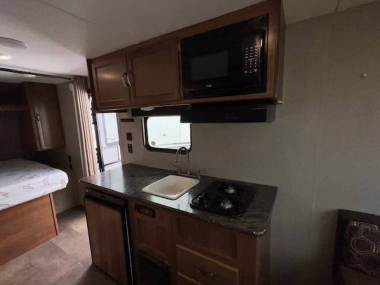 A photo of this 2018 Keystone Springdale Summerland Mini 1750RD Front East-West Queen