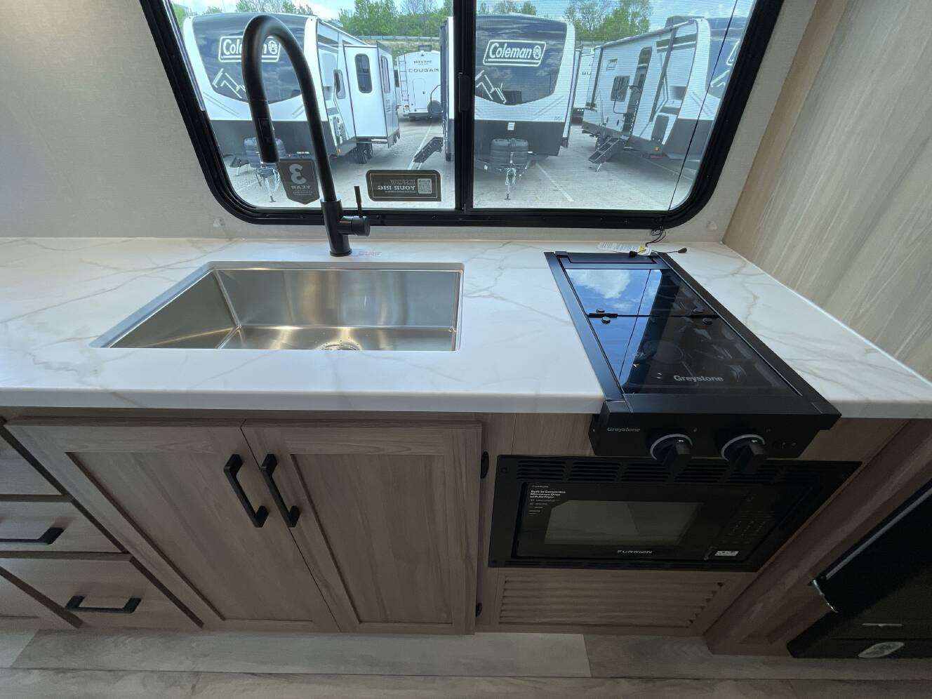 A photo of this 2026 Keystone COLEMAN LIGHT 26BX