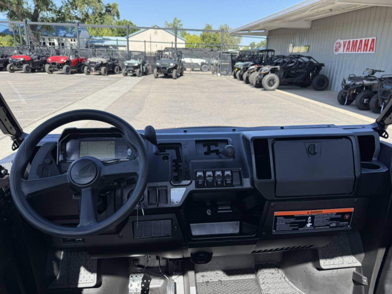 A photo of this 2026 Honda Pioneer 1000 Deluxe
