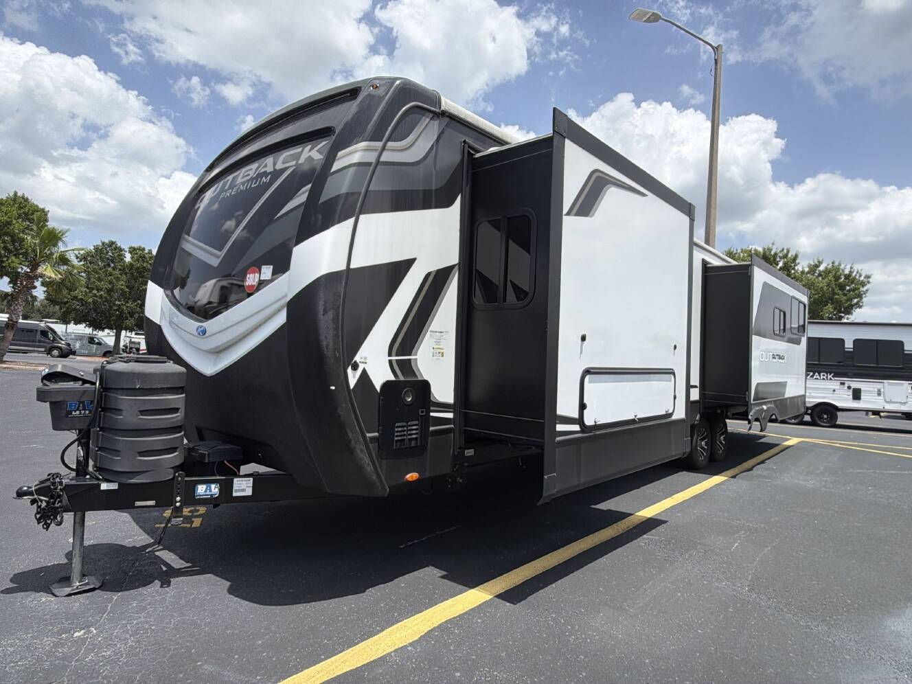 A photo of this 2025 Keystone OUTBACK 328RL