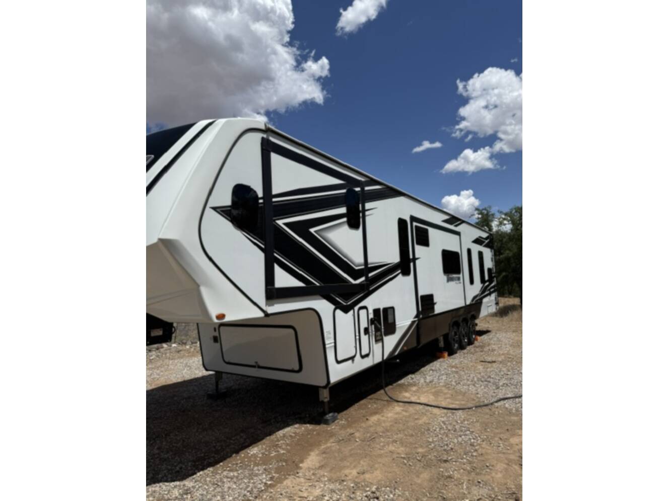 A photo of this 2023 Grand Design MOMENTUM M-CLASS 395MS