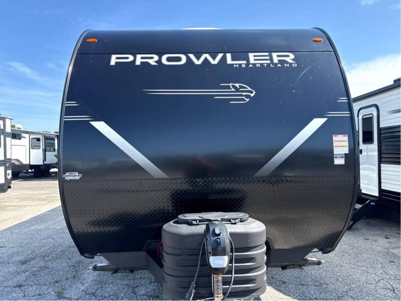 A photo of this 2027 Heartland Prowler 3202DSB