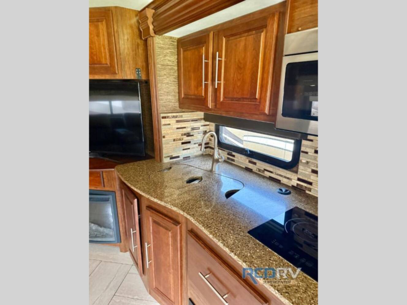 A photo of this 2016 Coachmen Rv Sportscoach Cross Country RD 407FW