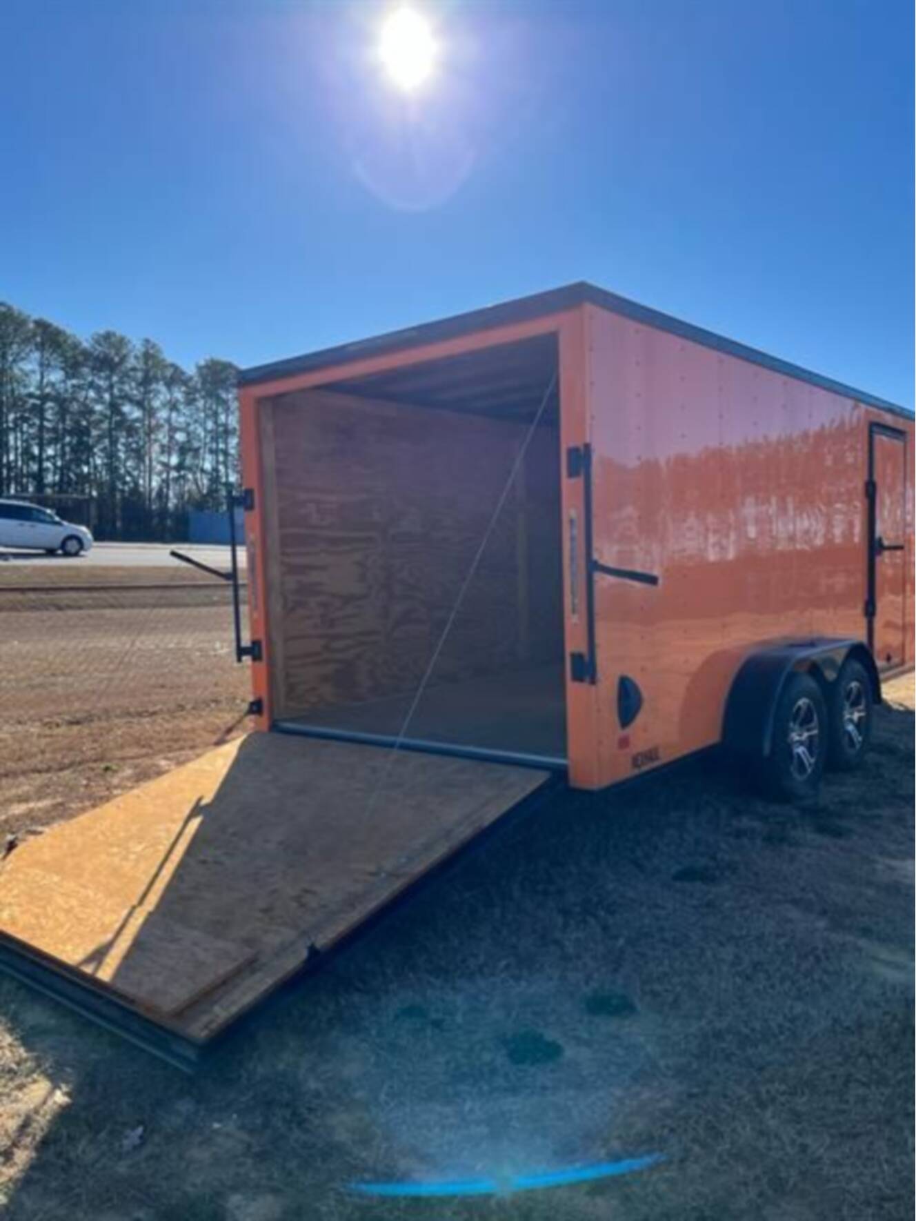 A photo of this 2023 Nexhaul Trailers 7X16 TA ORG/BLKOUT RIMS