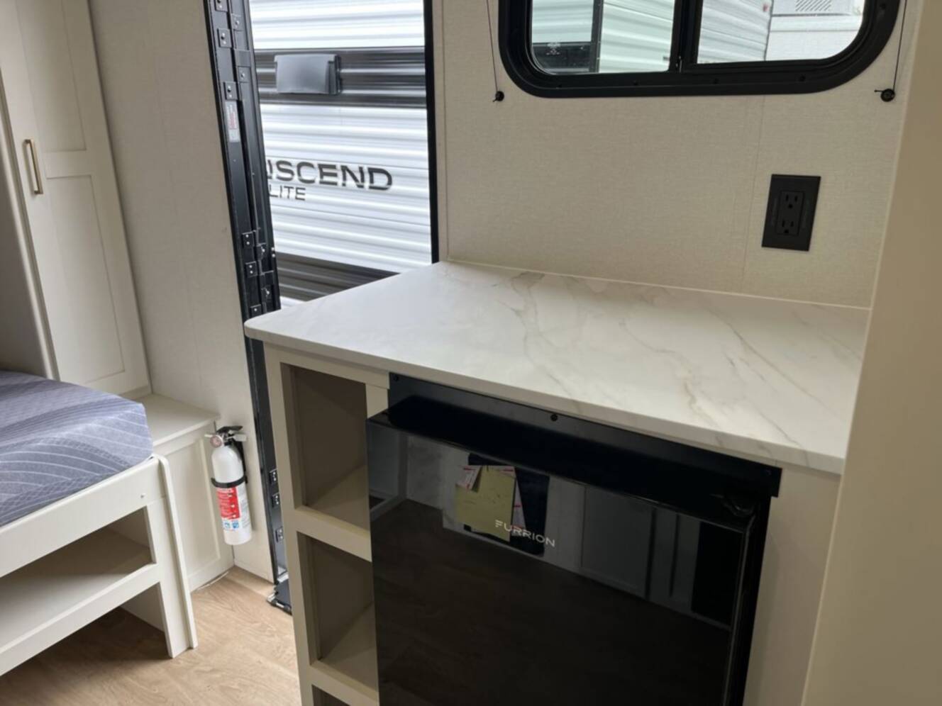 A photo of this 2027 Grand Design Transcend Lite 121RBL