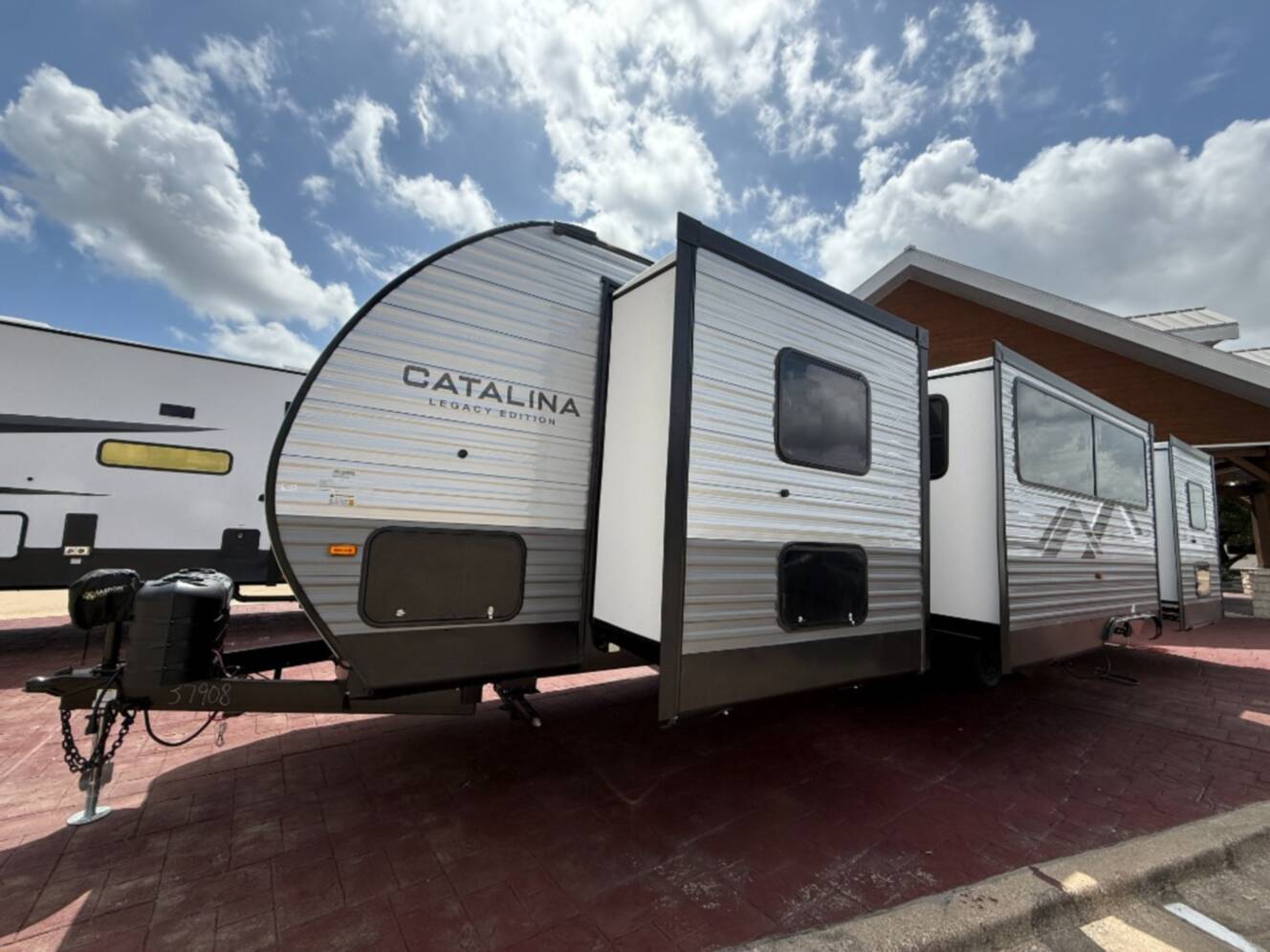 A photo of this 2027 Coachmen Rv Catalina Legacy Edition 343BHTS 2 Queen Beds