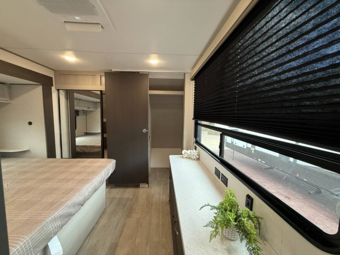 A photo of this 2027 Coachmen Rv Catalina Legacy Edition 343BHTS 2 Queen Beds