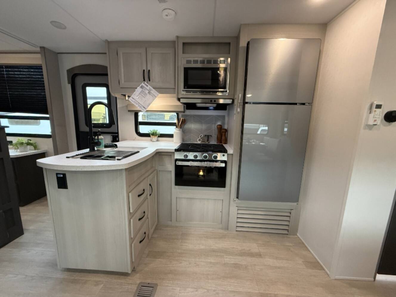 A photo of this 2027 Coachmen Rv Catalina Legacy Edition 343BHTS 2 Queen Beds