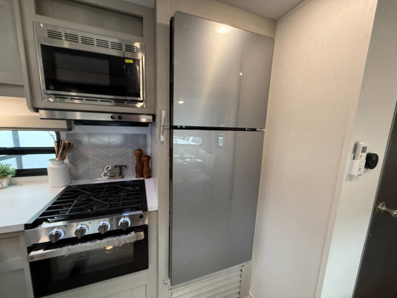 A photo of this 2027 Coachmen Rv Catalina Legacy Edition 343BHTS 2 Queen Beds