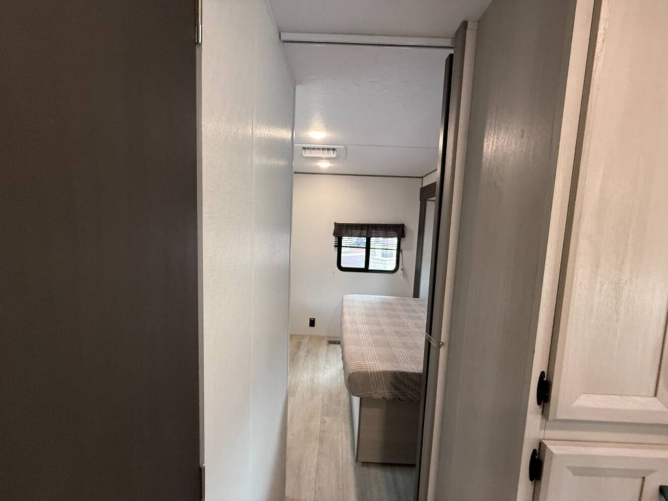 A photo of this 2027 Coachmen Rv Catalina Legacy Edition 343BHTS 2 Queen Beds