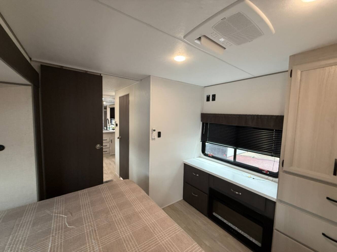 A photo of this 2027 Coachmen Rv Catalina Legacy Edition 343BHTS 2 Queen Beds