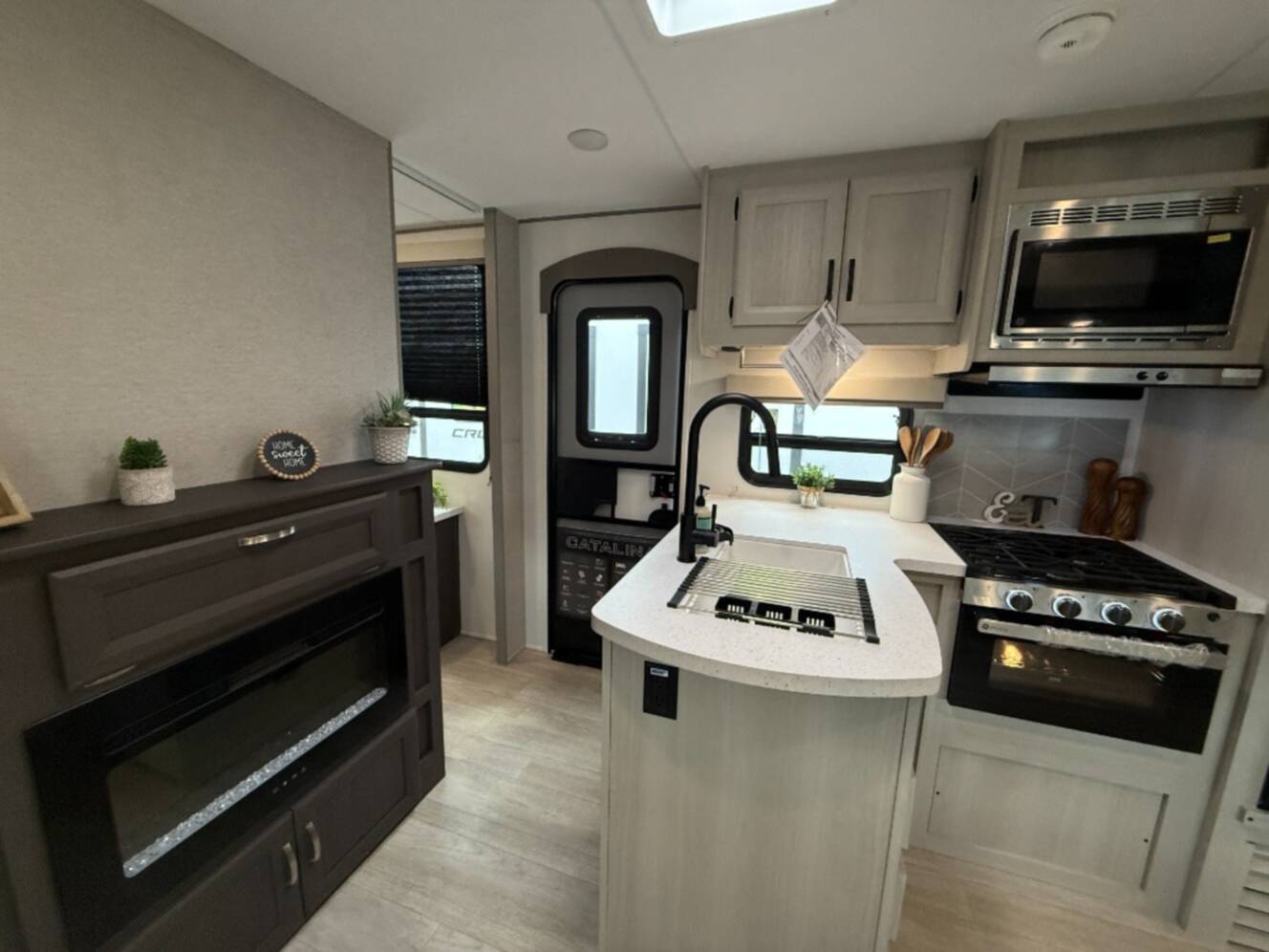 A photo of this 2027 Coachmen Rv Catalina Legacy Edition 343BHTS 2 Queen Beds