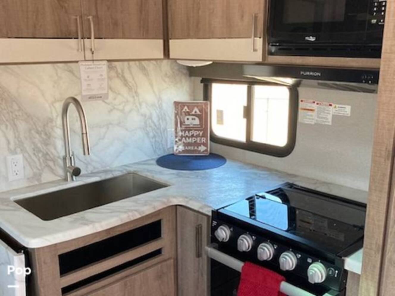 A photo of this 2022 Grand Design Imagine 2400BH