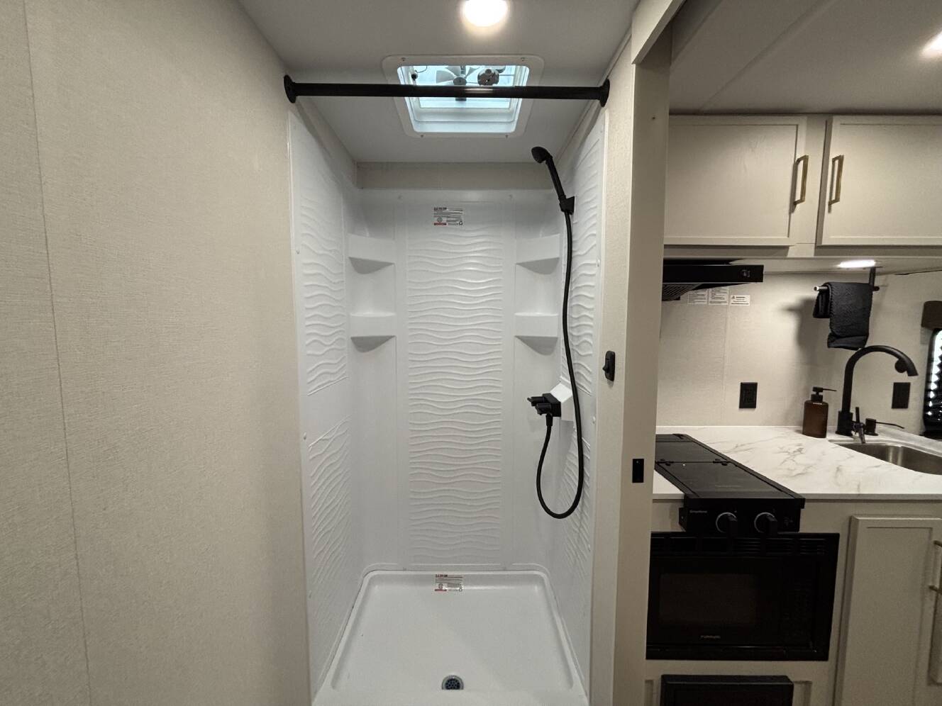 A photo of this 2027 Grand Design TRANSCEND LITE 121RBL