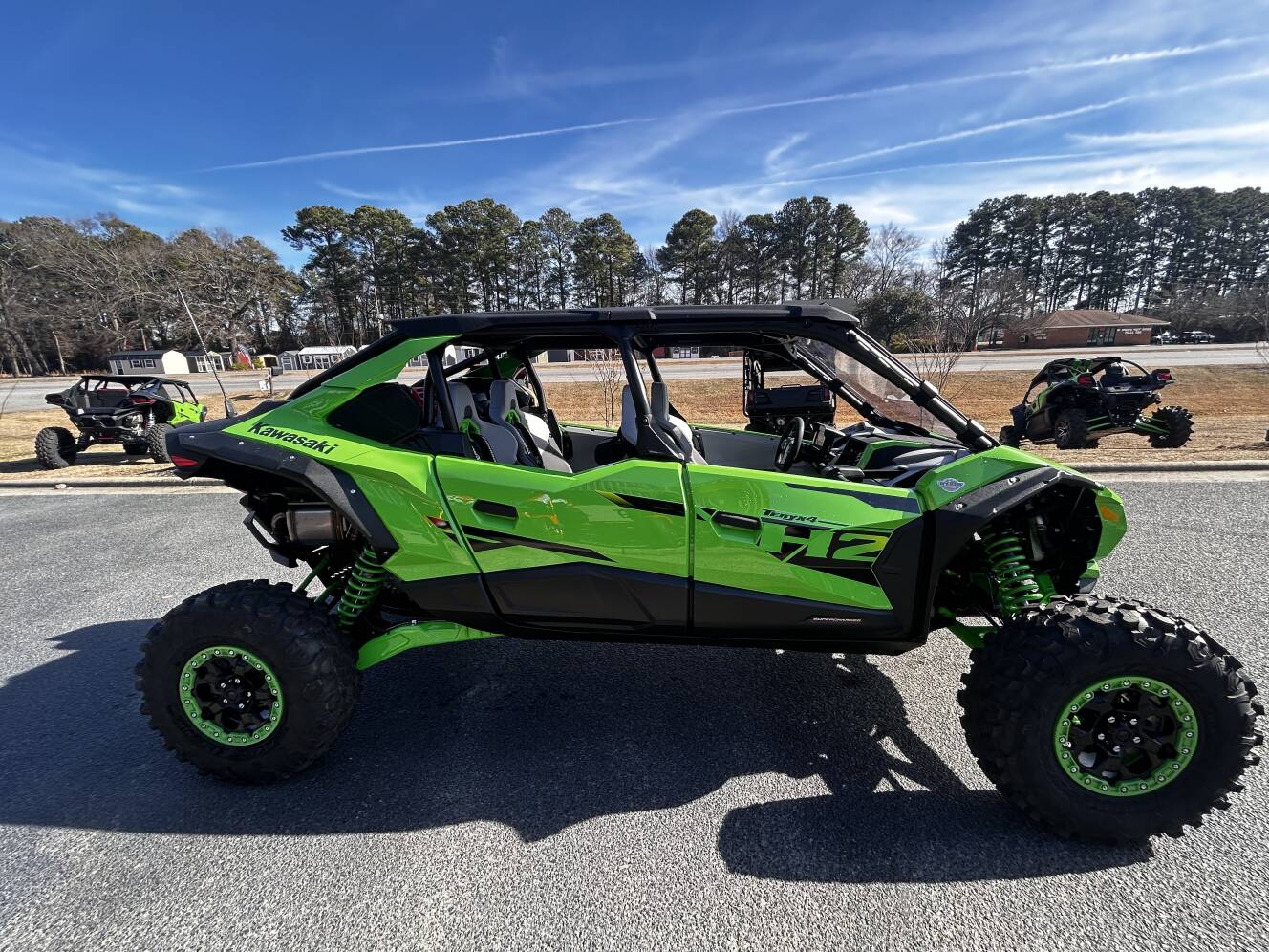 A photo of this 2026 Kawasaki Teryx®4 H2 Deluxe eS