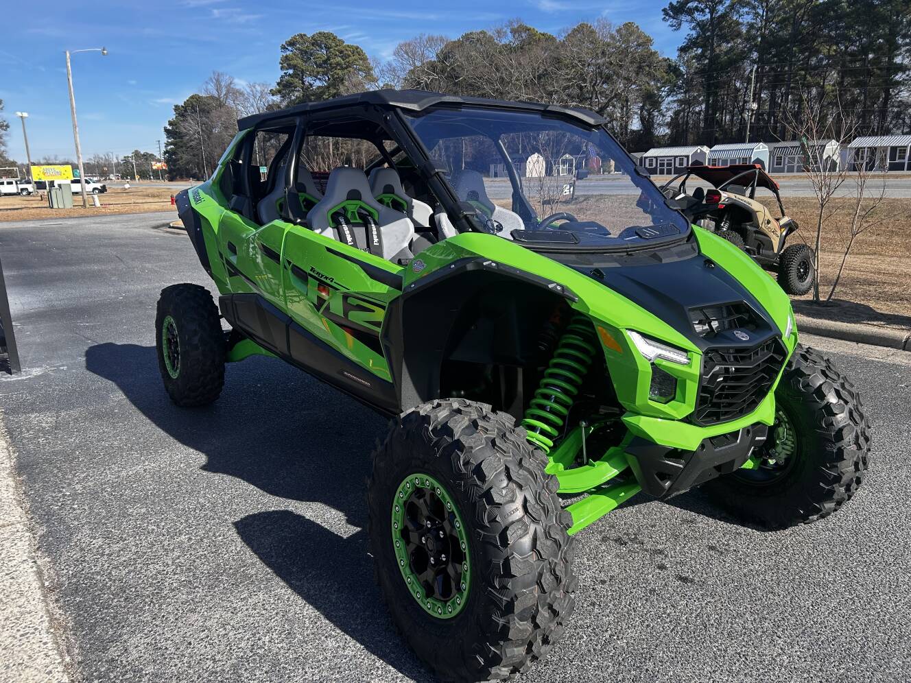 A photo of this 2026 Kawasaki Teryx®4 H2 Deluxe eS