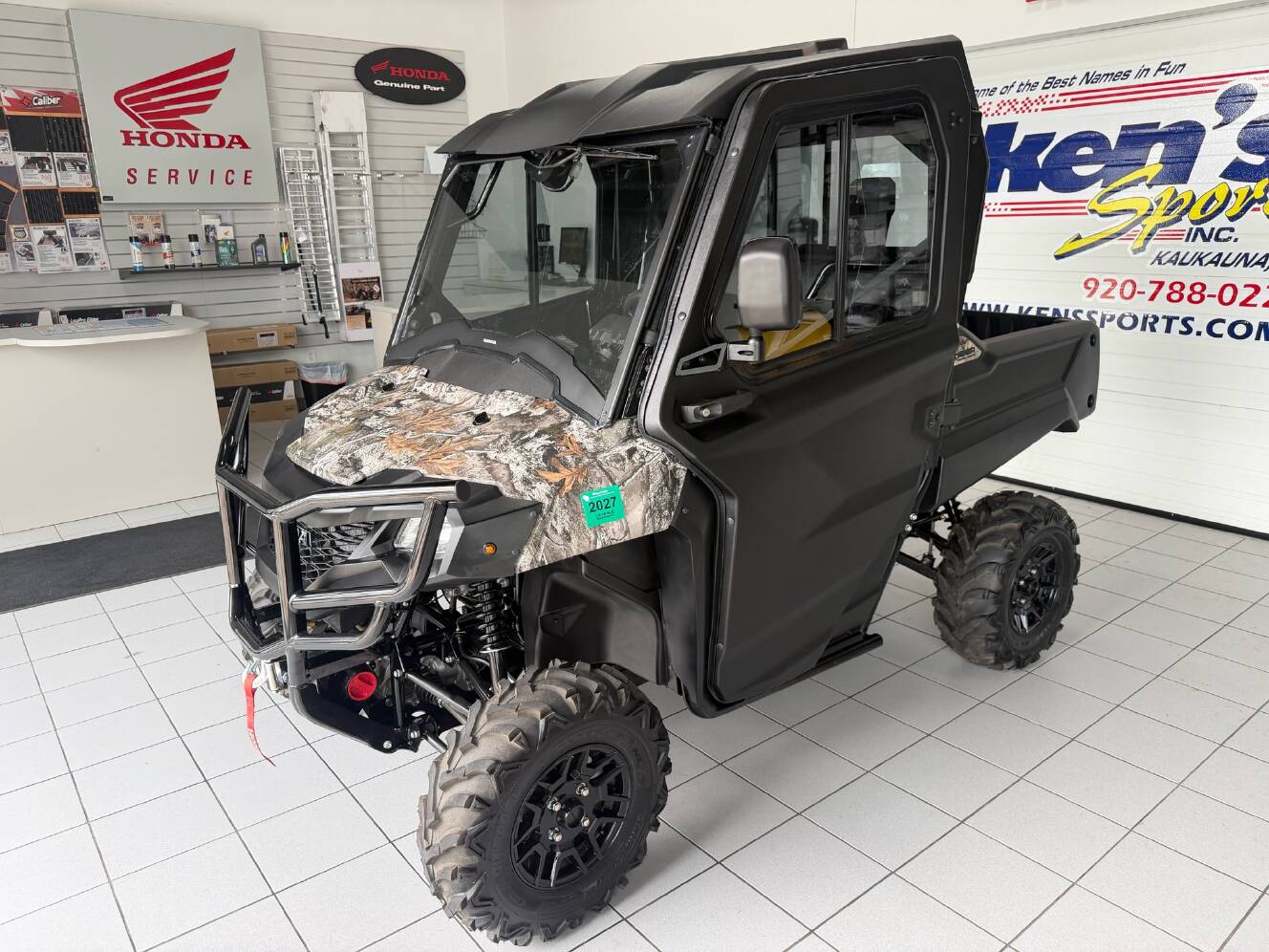 A photo of this 2025 Honda Pioneer 700 Forest