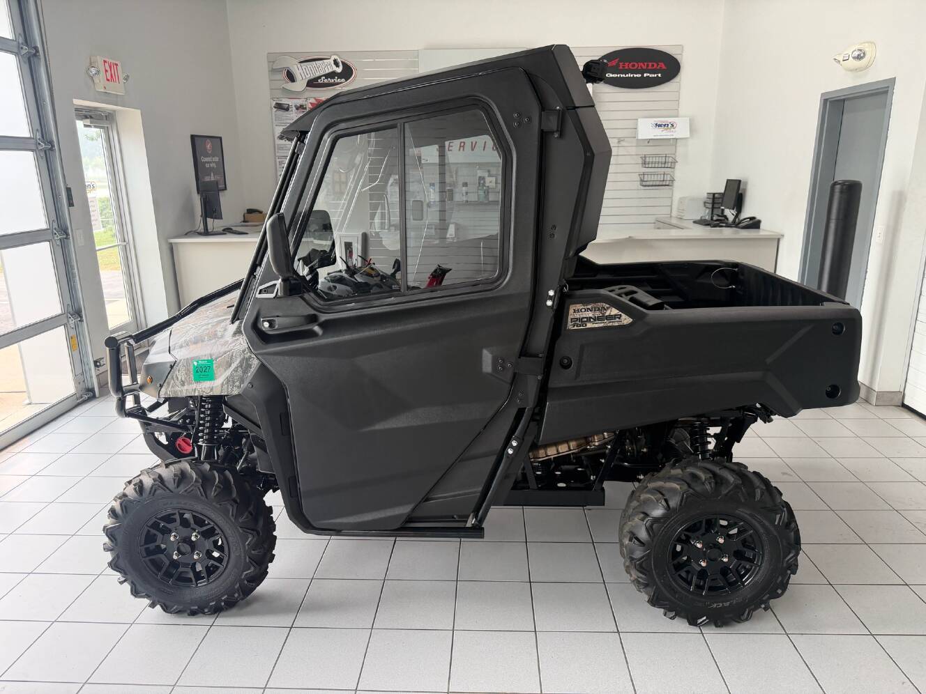 A photo of this 2025 Honda Pioneer 700 Forest