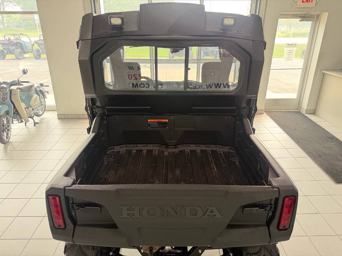A photo of this 2025 Honda Pioneer 700 Forest