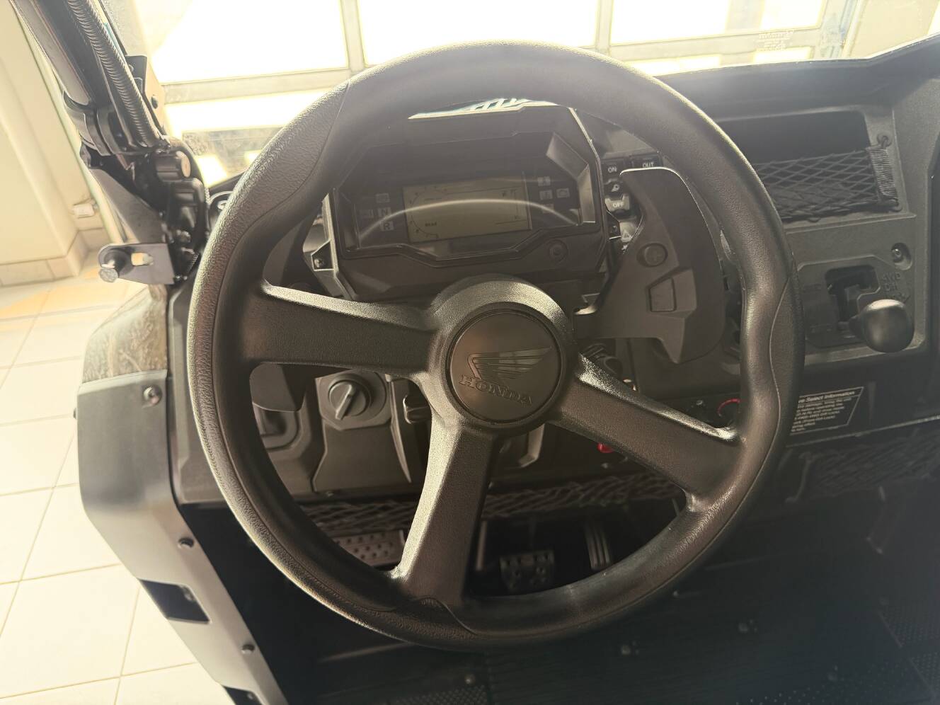 A photo of this 2025 Honda Pioneer 700 Forest