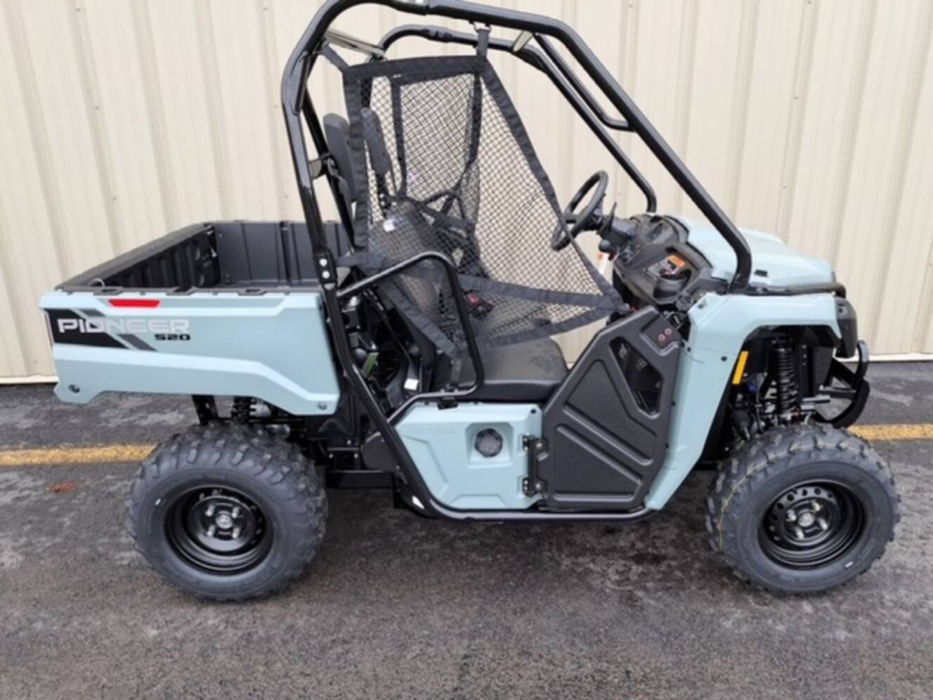 A photo of this 2026 Honda® Pioneer 520
