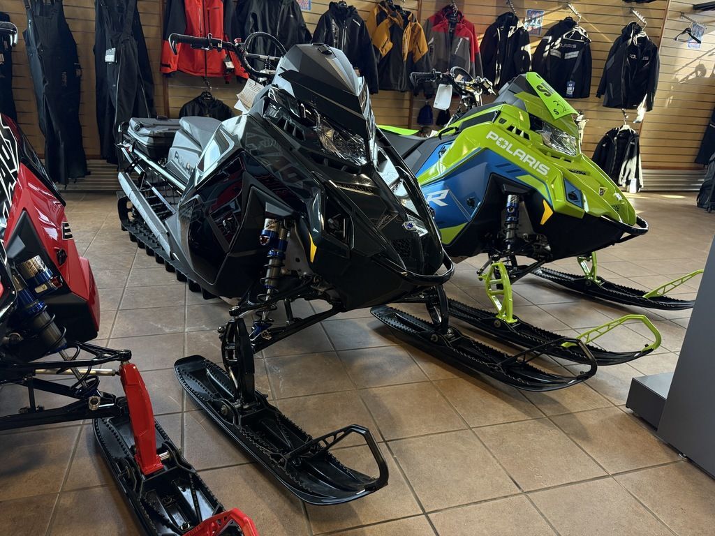 2026 Polaris® Patriot Boost RMK Khaos 155 Gloss Black / Blue Dusk in red wing MN