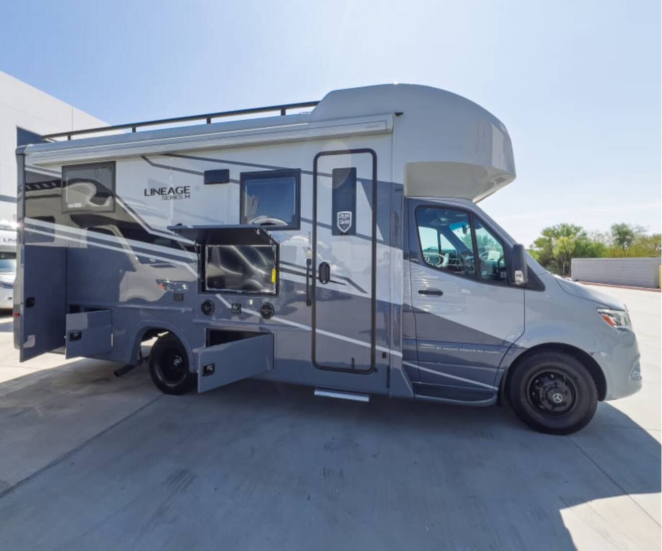 A photo of this 2027 Grand Design LINEAGE SERIES M 25TK-FBP