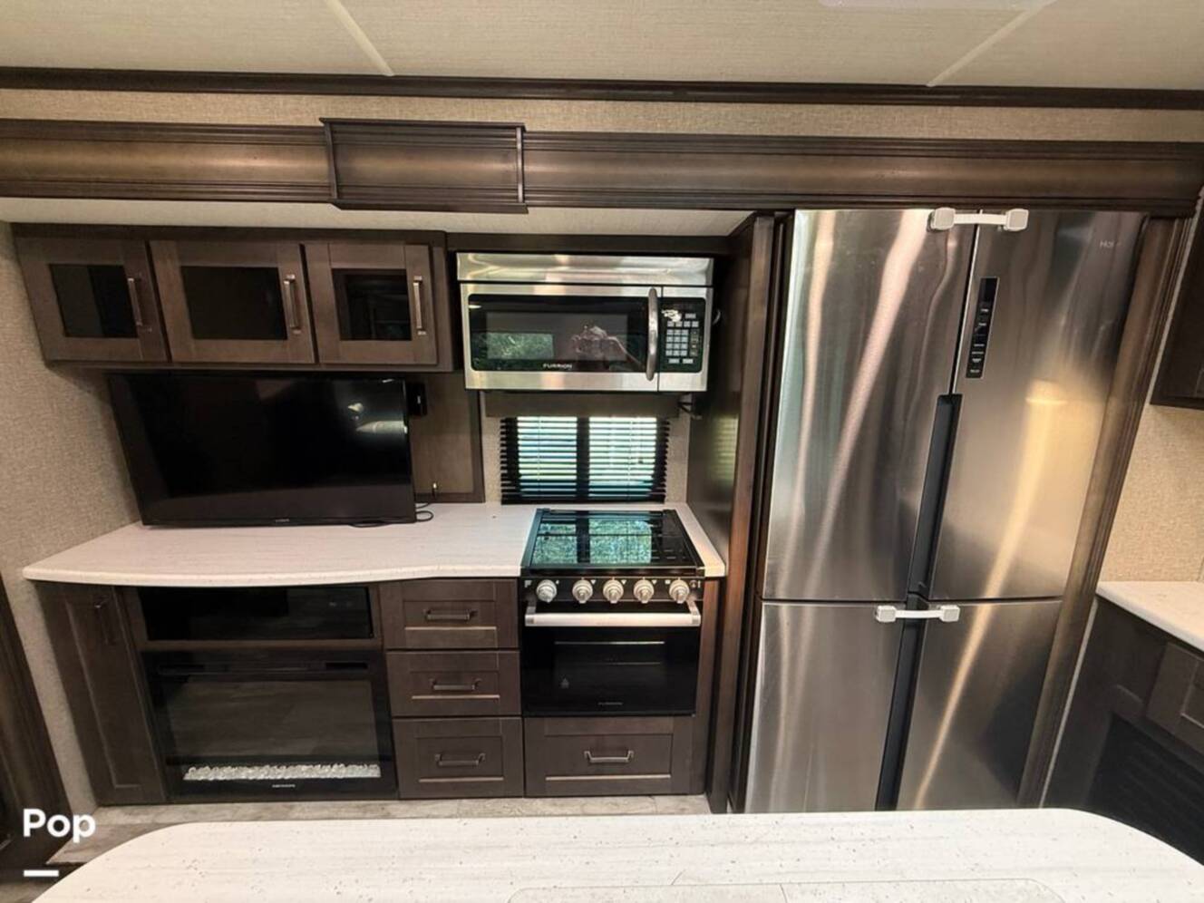 A photo of this 2021 Grand Design Reflection 312BHTS