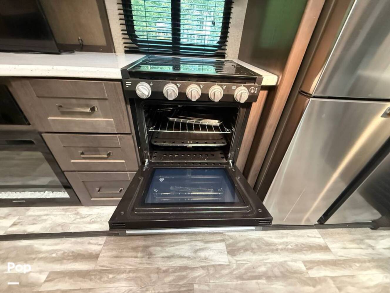 A photo of this 2021 Grand Design Reflection 312BHTS