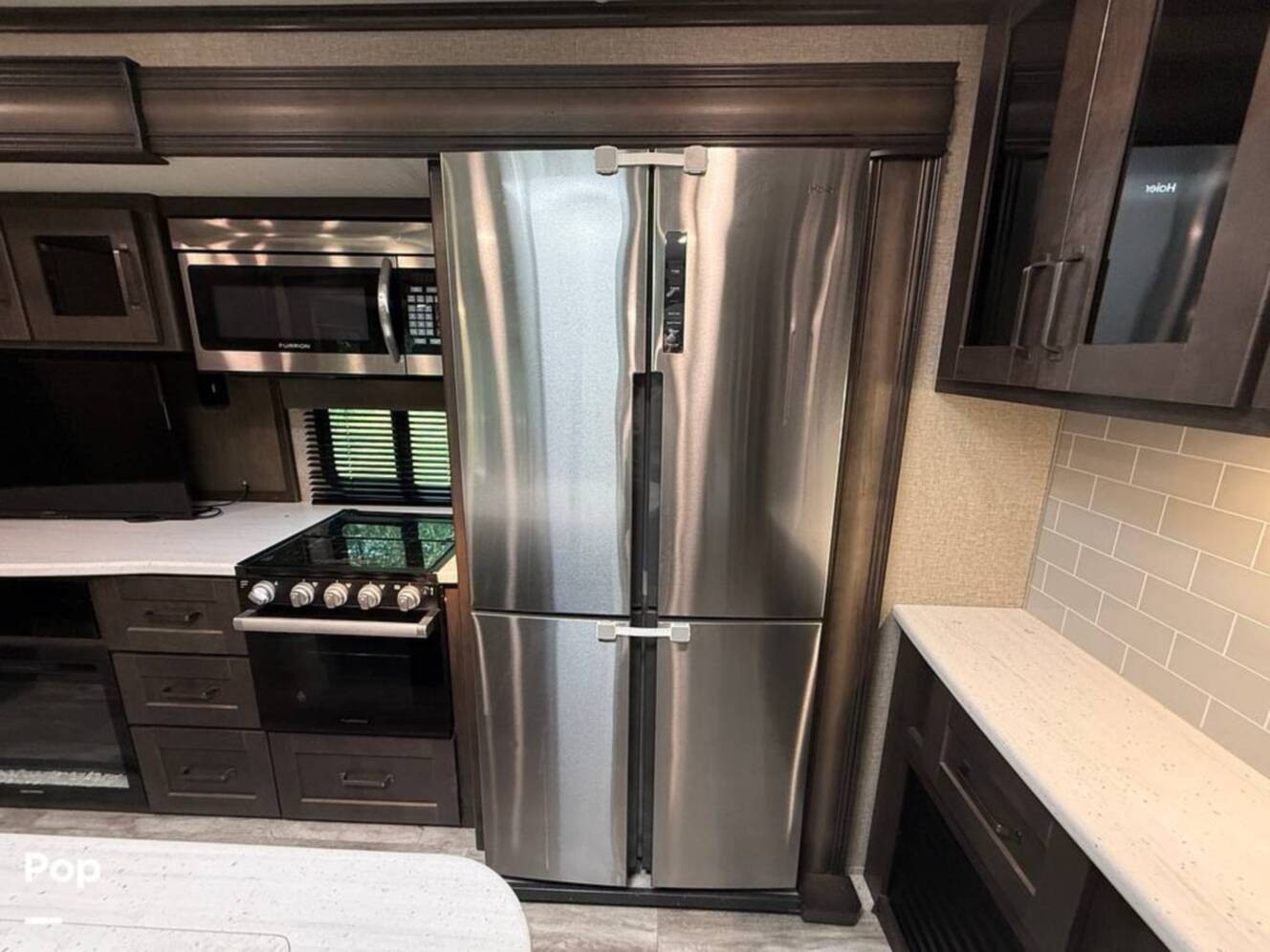 A photo of this 2021 Grand Design Reflection 312BHTS