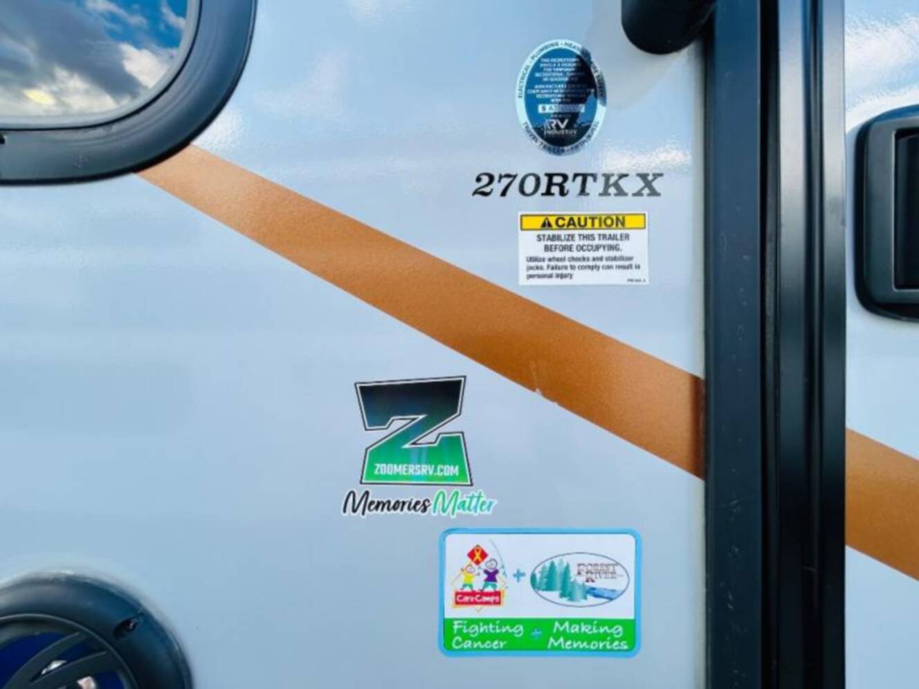 A photo of this 2023 Forest River Wildwood FSX 270RTKX