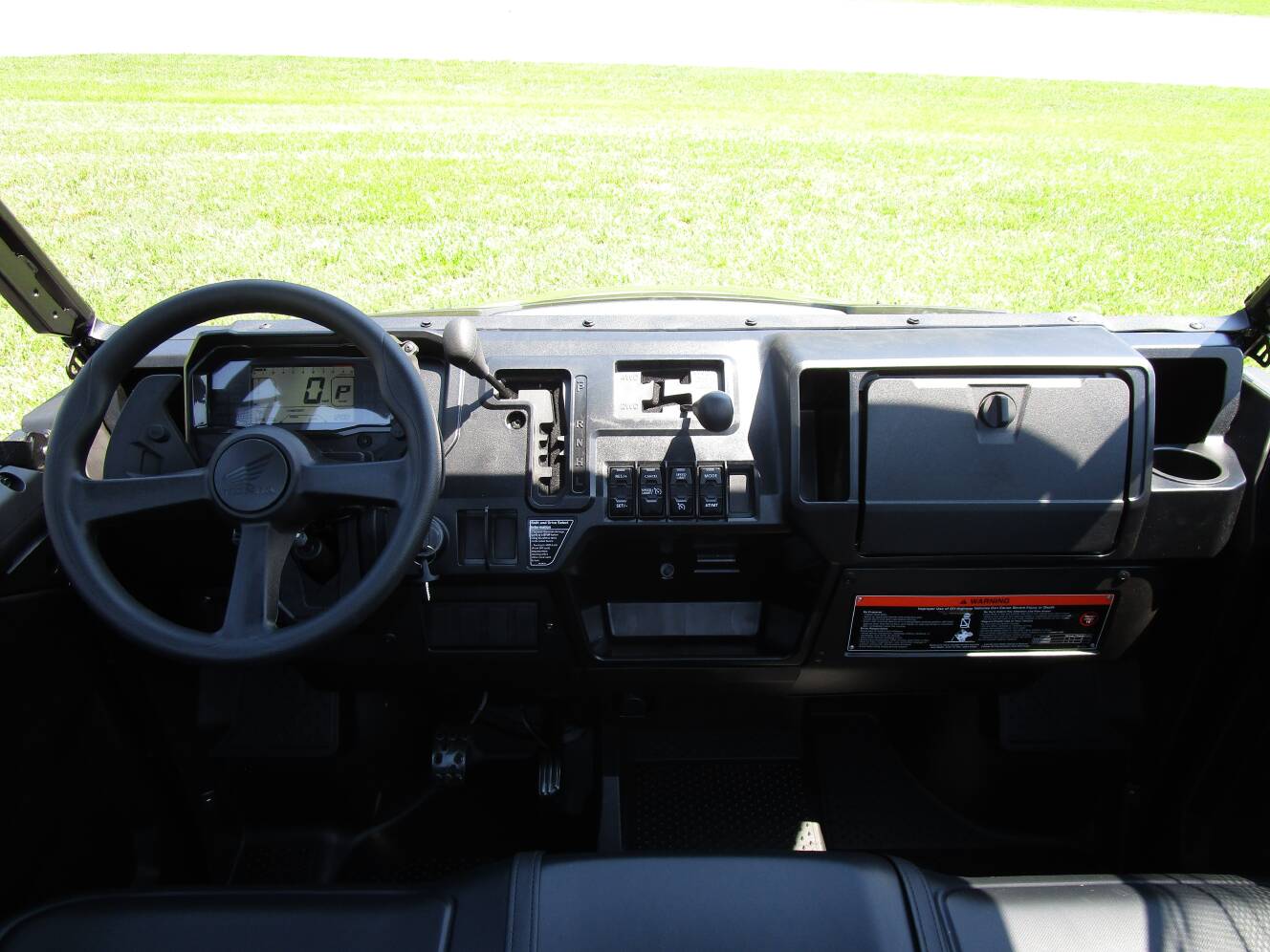 A photo of this 2026 Honda Pioneer 1000 Deluxe