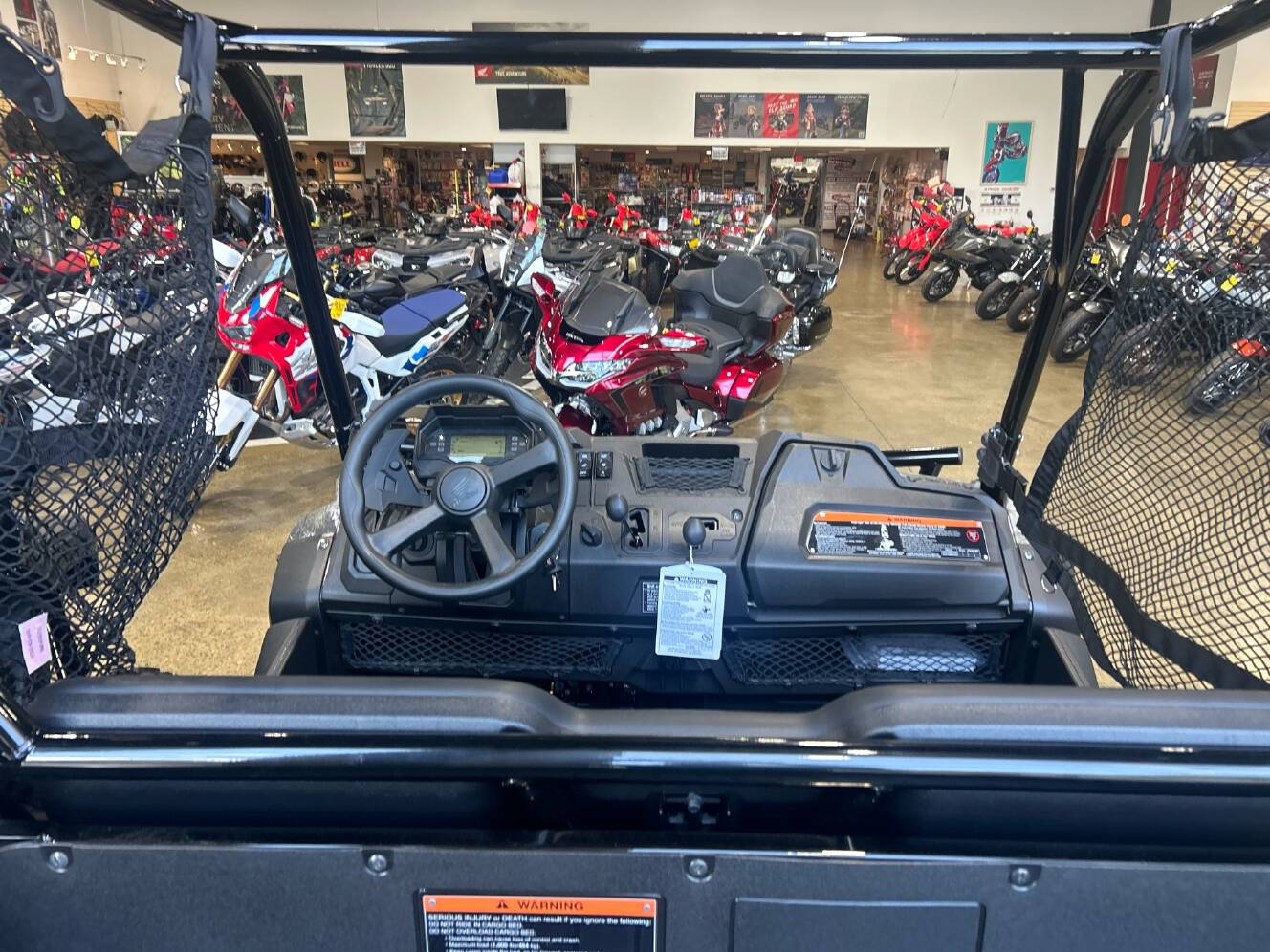 A photo of this 2026 Honda Pioneer 700 Forest