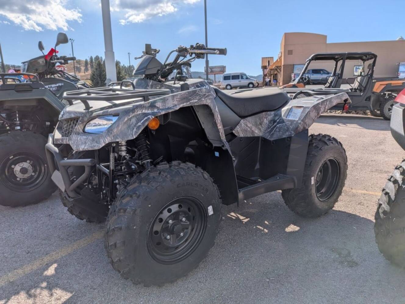 A photo of this 2025 Suzuki KingQuad 400ASi Camo