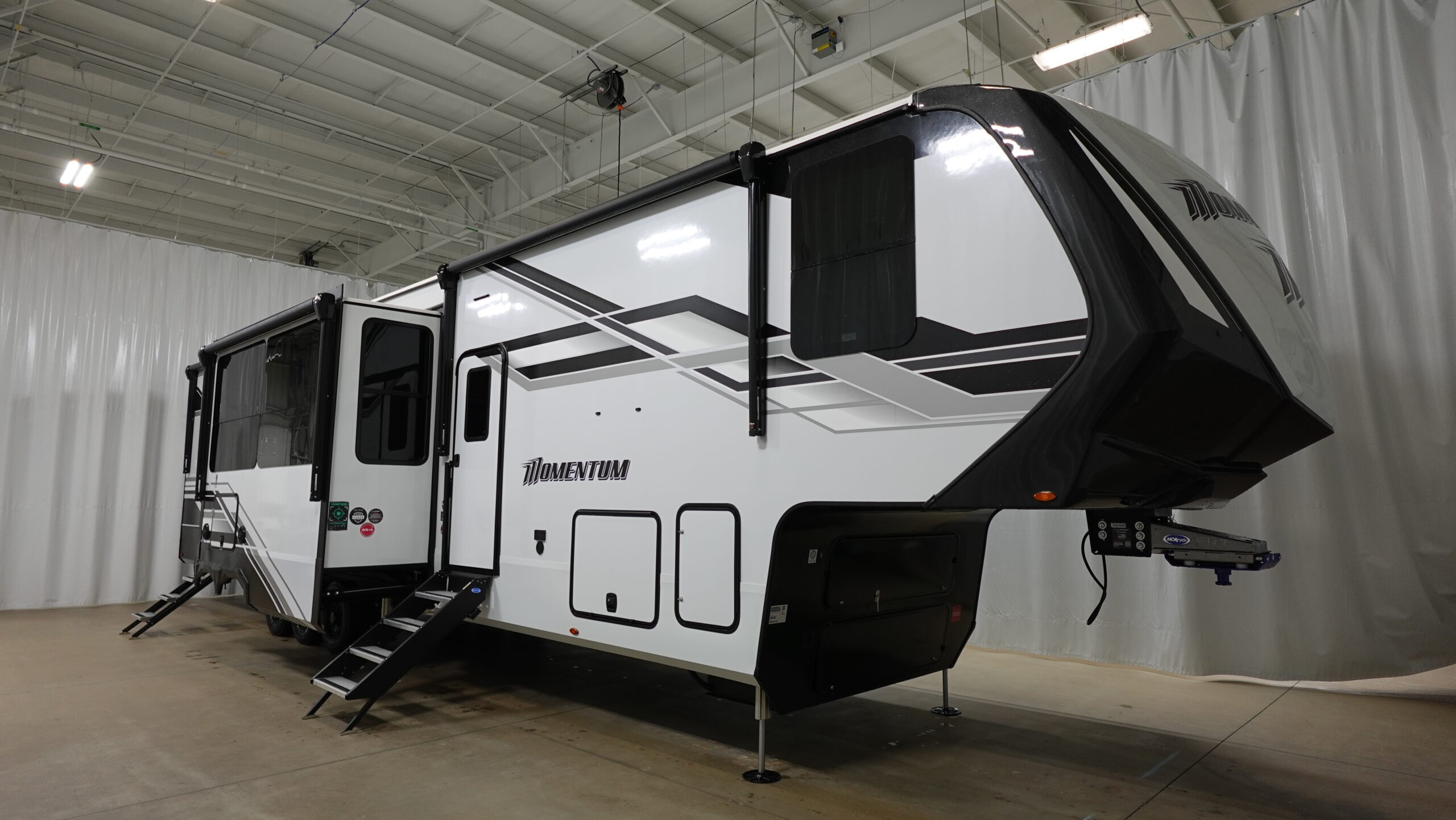 2026 Grand Design MOMENTUM 395MT Fifth Wheel Toy Hauler RV