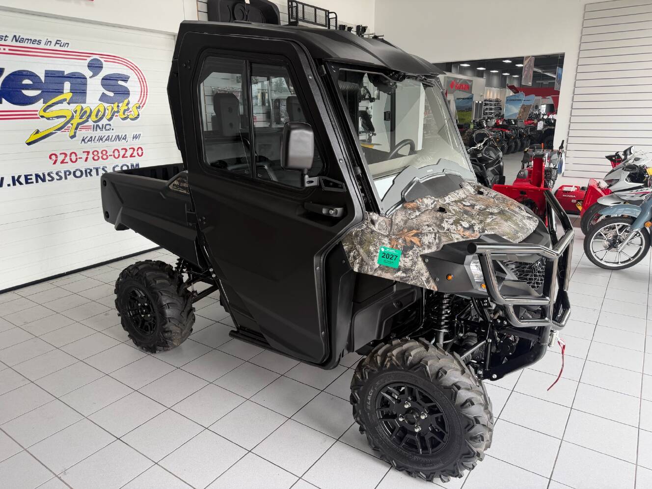A photo of this 2025 Honda Pioneer 700 Forest