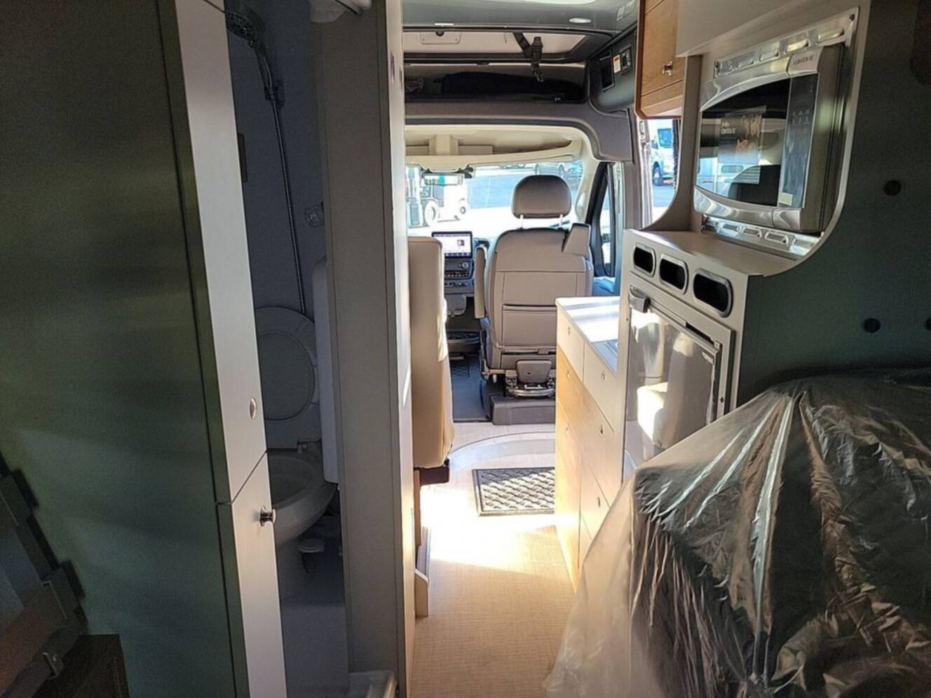A photo of this 2026 Airstream Rangeline 21 Pop Top