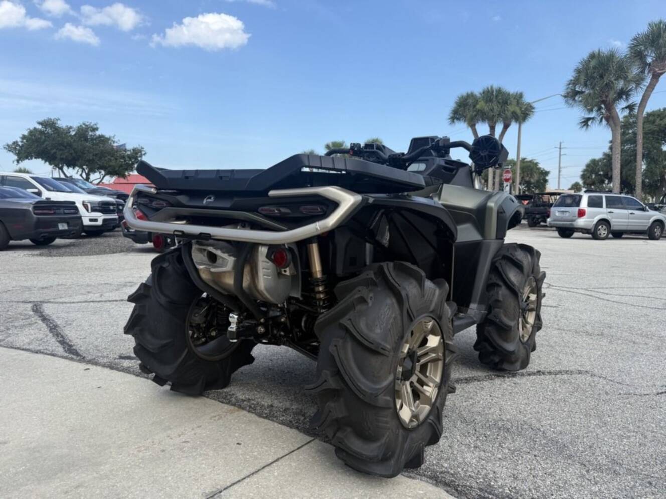 A photo of this 2026 Can-Am Outlander X mr 1000R Granite Grey