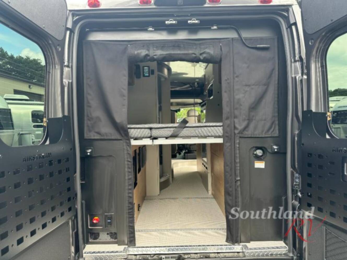 A photo of this 2026 Airstream Rangeline Pop Top Sleeper