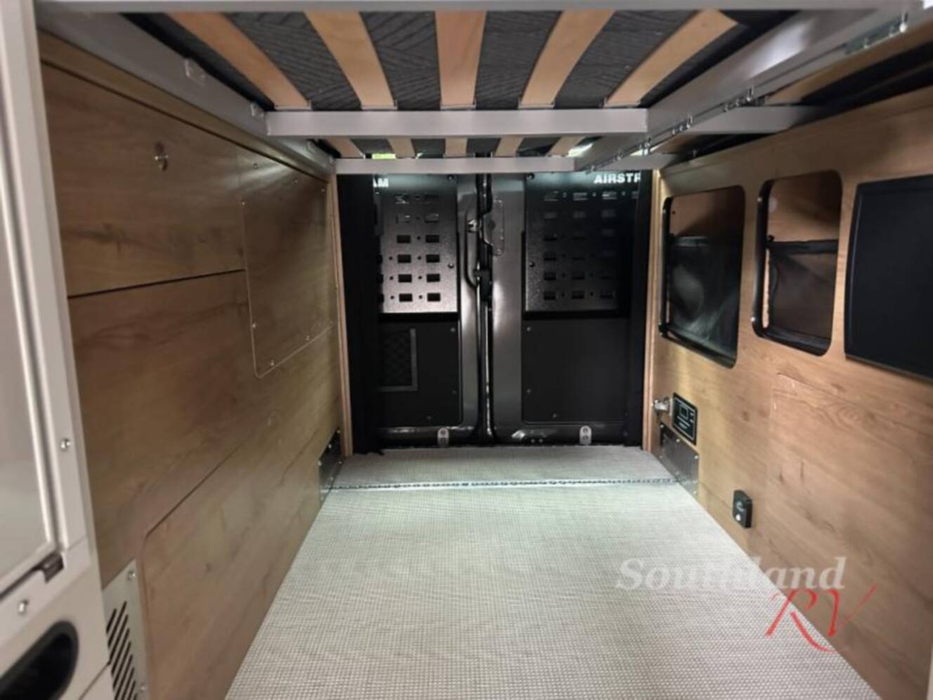 A photo of this 2026 Airstream Rangeline Pop Top Sleeper