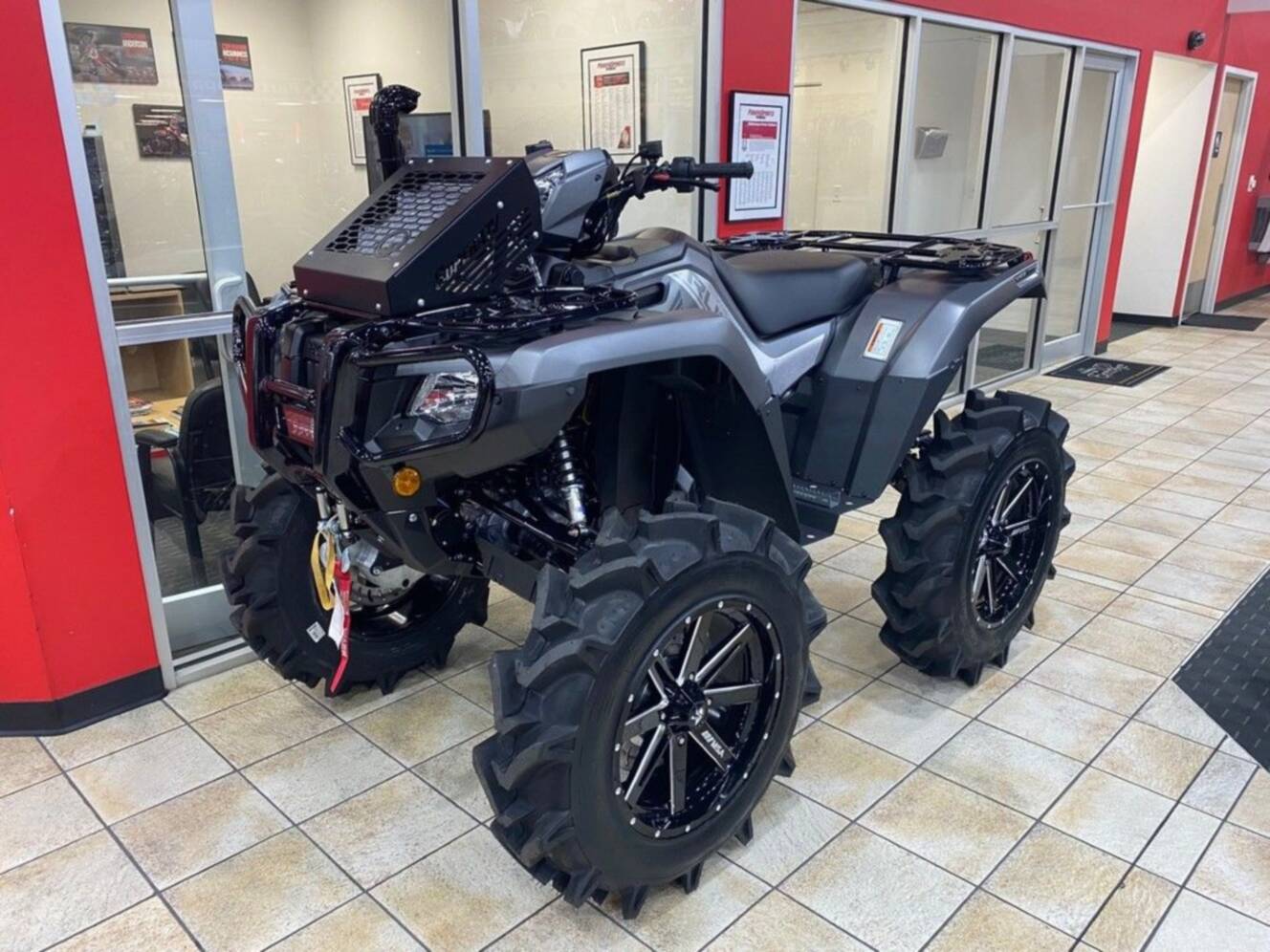A photo of this 2026 Honda® FourTrax Foreman Rubicon 4x4 EPS Matte Gray Metallic
