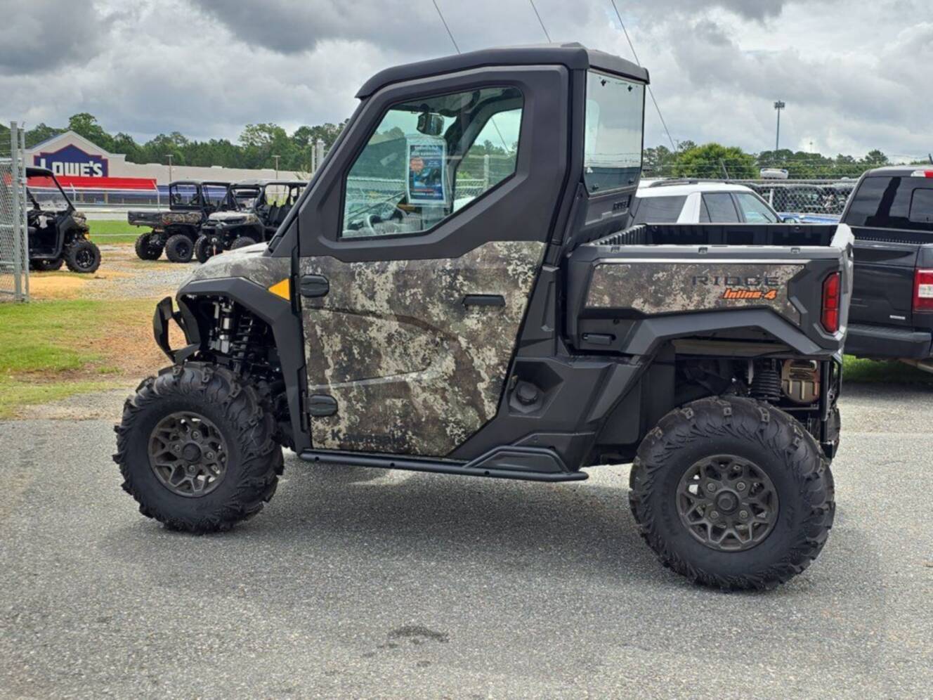 A photo of this 2025 Kawasaki Ridge® Hvac Camo